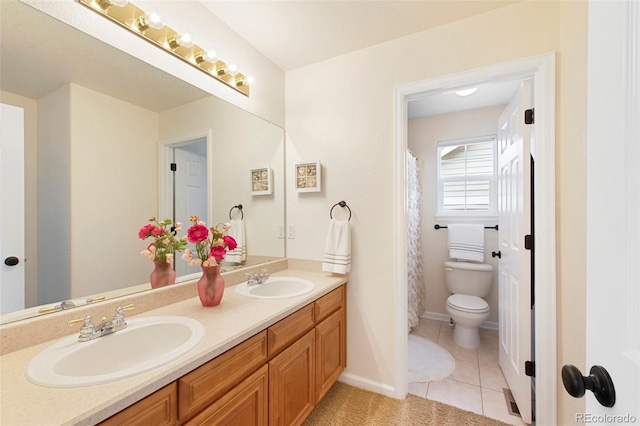 10633 Wynspire Way, Highlands Ranch, CO 80130 - full bath with double vanity and tile patterned floors
