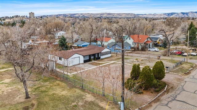bird's eye view with a mountain view and a residential view
