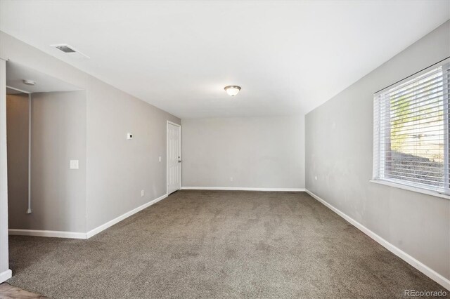 3900 Turnpike Dr, Westminster, CO 80030 - spare room with baseboards, carpet, and visible vents