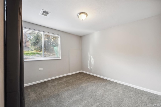 3900 Turnpike Dr, Westminster, CO 80030 - unfurnished room featuring baseboards, visible vents, and carpet