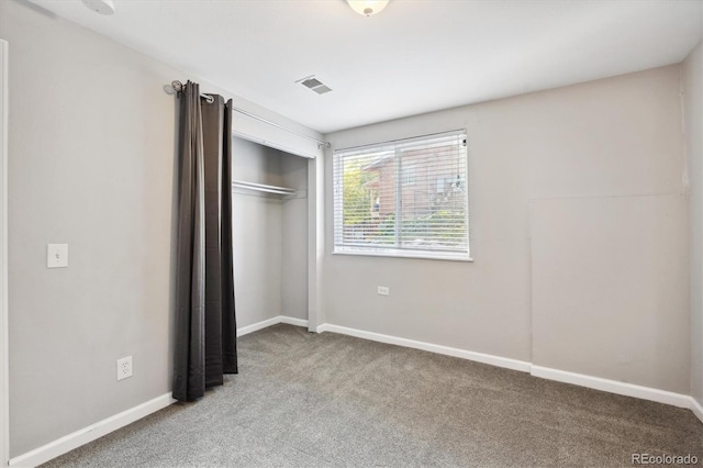 3900 Turnpike Dr, Westminster, CO 80030 - unfurnished bedroom featuring visible vents, carpet, baseboards, and a closet