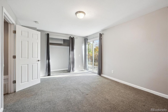 3900 Turnpike Dr, Westminster, CO 80030 - unfurnished bedroom featuring access to outside, carpet floors, baseboards, visible vents, and a closet