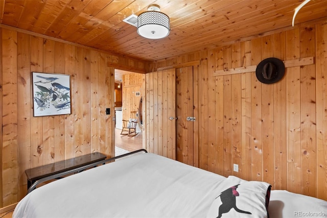 339 Hall Rd, Bailey, CO 80421 - bedroom featuring wood walls and wooden ceiling