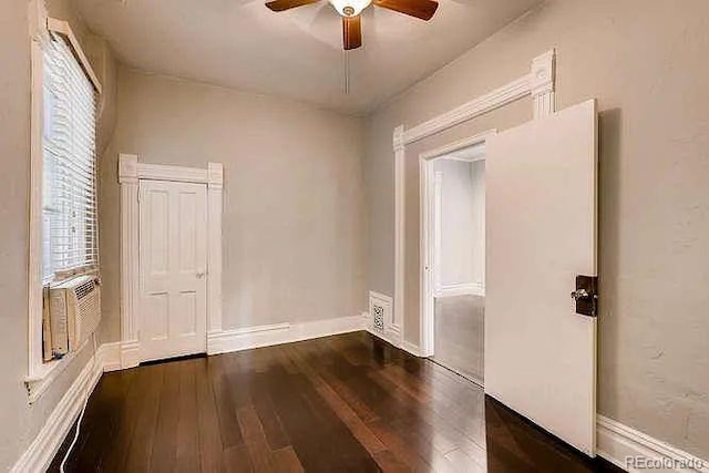 1365 Clayton St, Denver, CO 80206 - unfurnished bedroom featuring hardwood / wood-style flooring, ceiling fan, and baseboards
