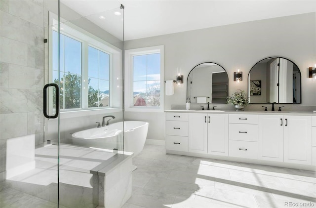 bathroom featuring vanity and plus walk in shower