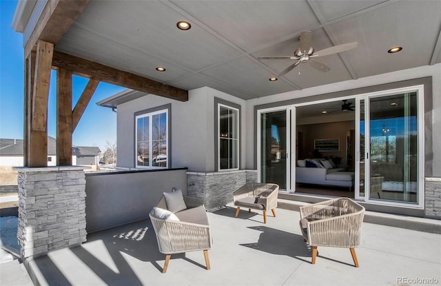 view of patio with ceiling fan