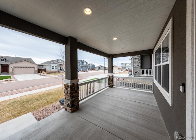 wooden deck featuring covered porch