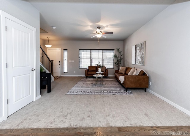 living room featuring ceiling fan