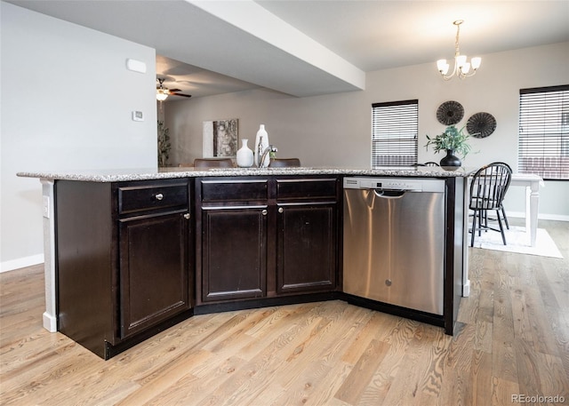 kitchen featuring light wood-type flooring, dark brown cabinets, ceiling fan with notable chandelier, dishwasher, and hanging light fixtures