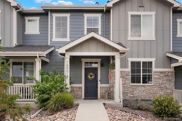 16461 E 119th Way Unit B, Commerce City, CO 80022 - view of front of property with board and batten siding and stone siding