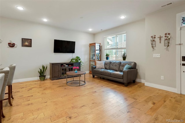 16461 E 119th Way Unit B, Commerce City, CO 80022 - living room featuring light wood finished floors and recessed lighting