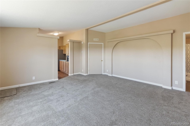 235 W May St, Cripple Creek, CO 80813 - spare room with dark carpet and baseboards
