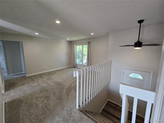 1265 S Biscay St, Aurora, CO 80017 - stairs with recessed lighting, a textured ceiling, carpet flooring, and ceiling fan