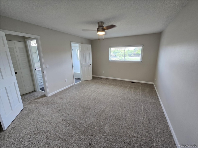 1265 S Biscay St, Aurora, CO 80017 - unfurnished bedroom with carpet floors, a textured ceiling, and ceiling fan