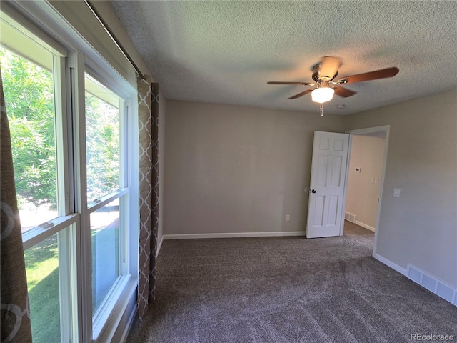 1265 S Biscay St, Aurora, CO 80017 - unfurnished room featuring a textured ceiling, a ceiling fan, and carpet floors