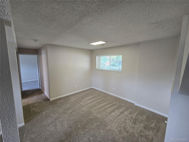 1265 S Biscay St, Aurora, CO 80017 - carpeted spare room featuring a textured ceiling