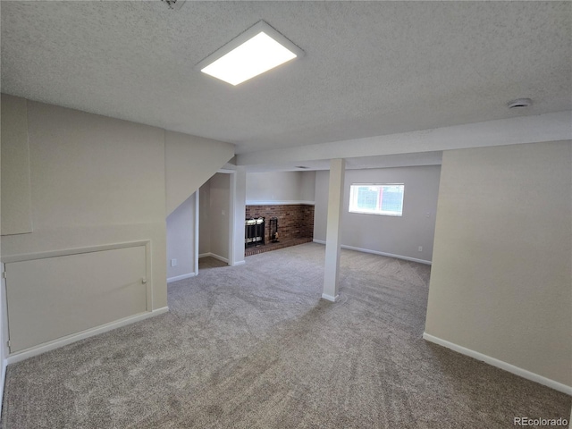 1265 S Biscay St, Aurora, CO 80017 - below grade area featuring carpet floors and a textured ceiling