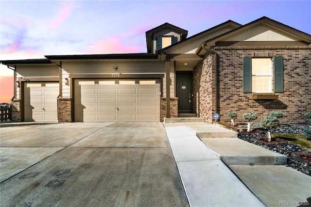 view of front of home with a garage