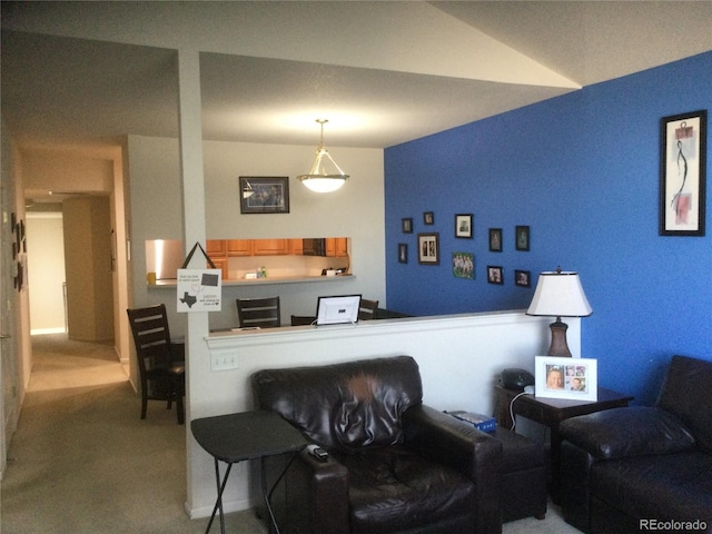 living room with light carpet and lofted ceiling