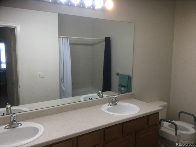 bathroom featuring vanity and shower / bathtub combination with curtain