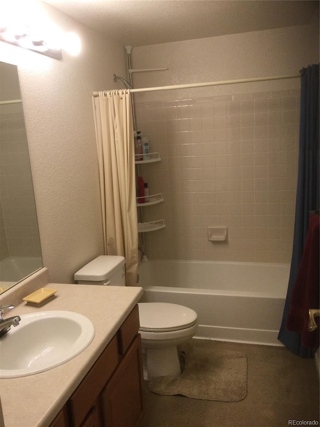 full bathroom with shower / tub combo with curtain, vanity, and toilet