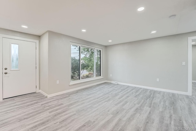 foyer with light hardwood / wood-style flooring