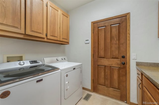 19165 Golden Arrow Cir, Monument, CO 80132 - laundry area featuring separate washer and dryer and cabinet space