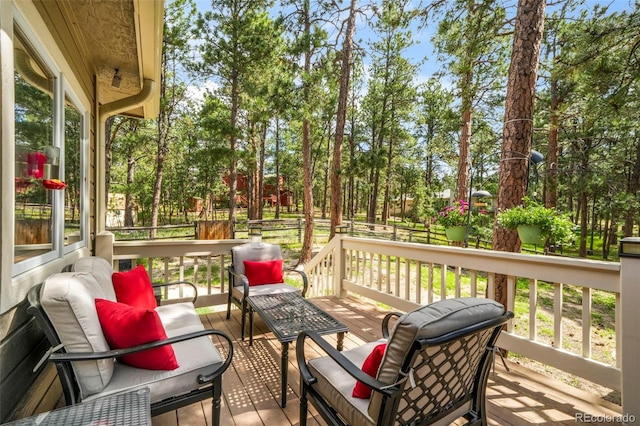 19165 Golden Arrow Cir, Monument, CO 80132 - deck with view of scattered trees and outdoor lounge area