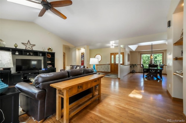 19165 Golden Arrow Cir, Monument, CO 80132 - living area with ceiling fan, light wood-style flooring, and lofted ceiling