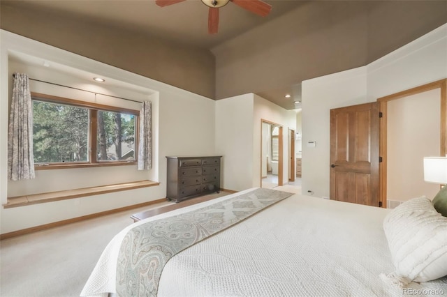 19165 Golden Arrow Cir, Monument, CO 80132 - carpeted bedroom featuring a towering ceiling, connected bathroom, recessed lighting, and a ceiling fan