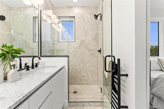 bathroom featuring vanity and walk in shower