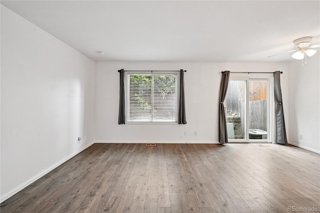 2085 E 103rd Ave, Thornton, CO 80229 - spare room with wood finished floors and ceiling fan