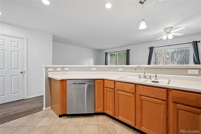 2085 E 103rd Ave, Thornton, CO 80229 - kitchen featuring stainless steel dishwasher, ceiling fan, light countertops, decorative light fixtures, and light tile patterned flooring