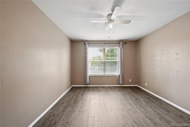 2085 E 103rd Ave, Thornton, CO 80229 - spare room with a ceiling fan and wood finished floors