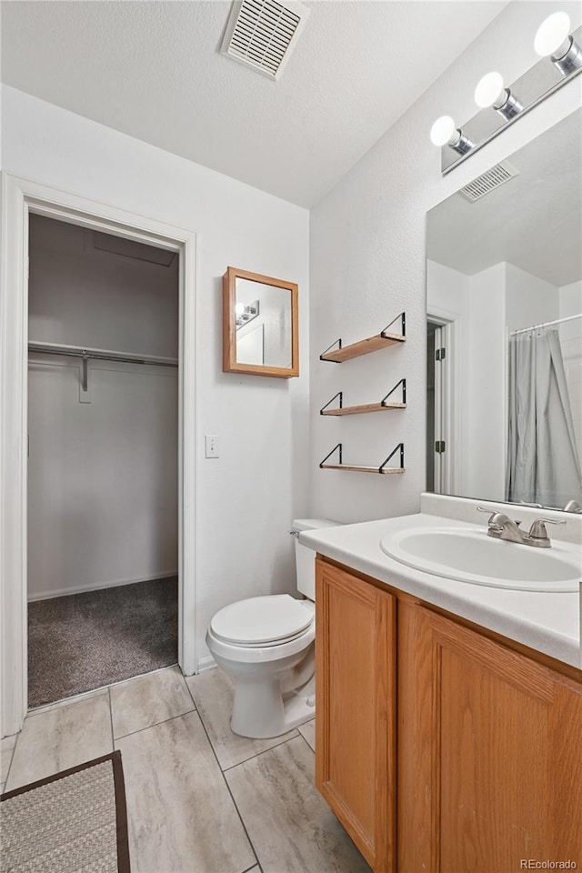 2085 E 103rd Ave, Thornton, CO 80229 - full bathroom featuring vanity and a shower with curtain