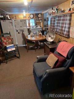 view of carpeted dining area