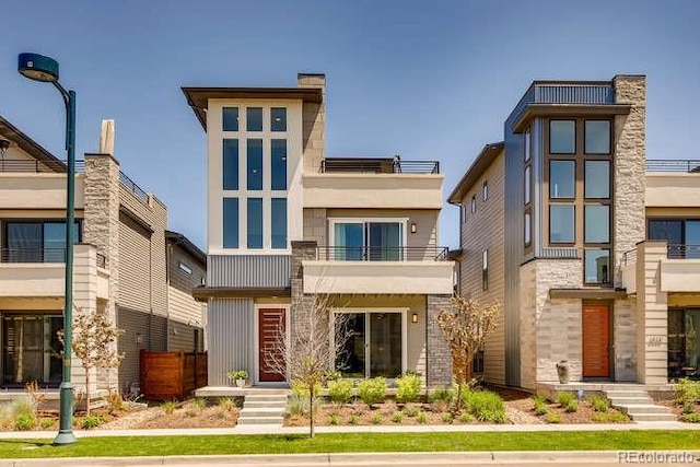 contemporary house featuring a balcony