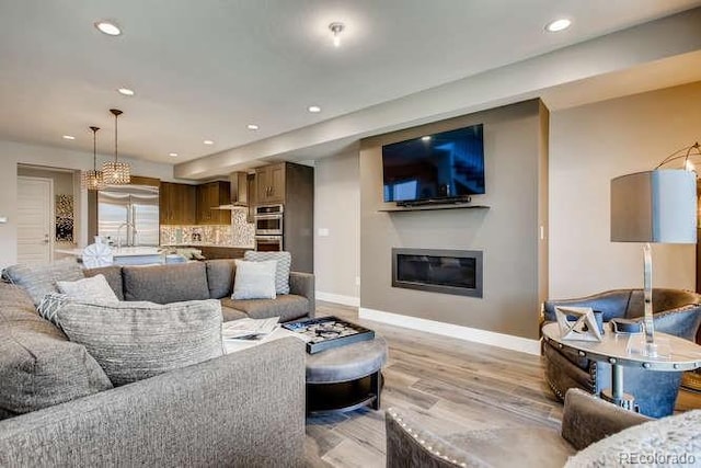 living room featuring light wood-type flooring