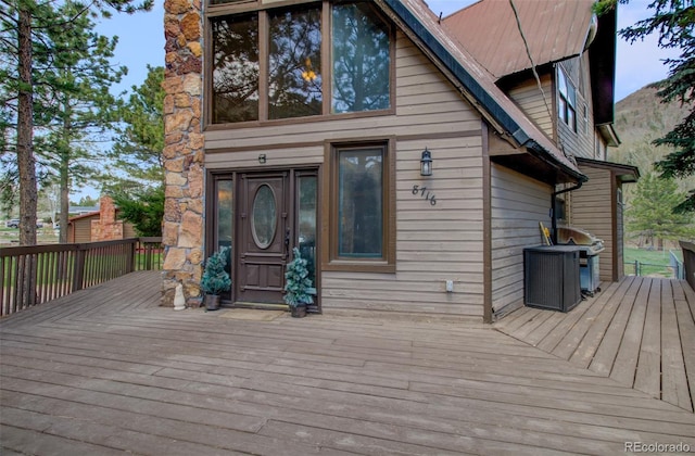 deck featuring a grill