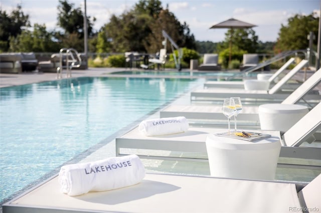 view of pool featuring a patio area