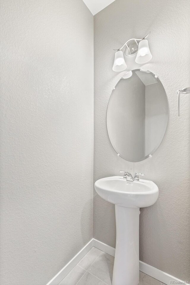 bathroom featuring baseboards