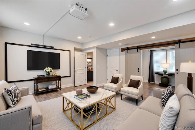 5080 Uinta St, Denver, CO 80238 - living room with a barn door, light wood-style floors, and recessed lighting