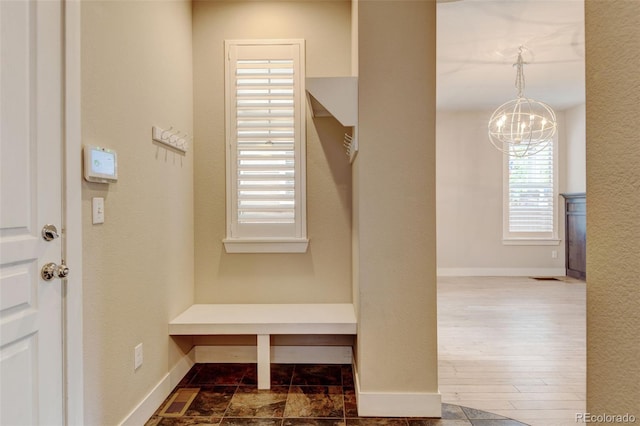 5080 Uinta St, Denver, CO 80238 - mudroom with a chandelier and baseboards