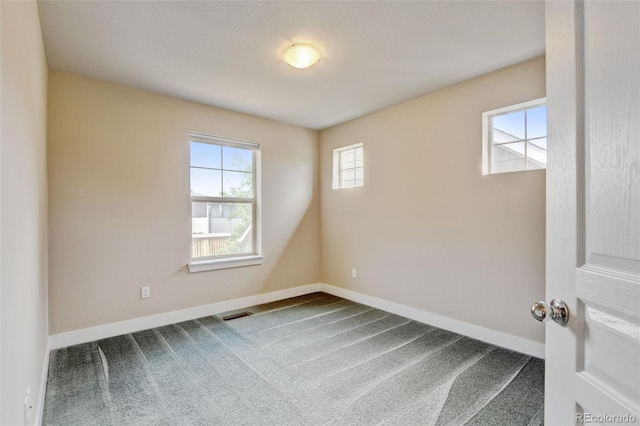 5080 Uinta St, Denver, CO 80238 - spare room with dark colored carpet and baseboards