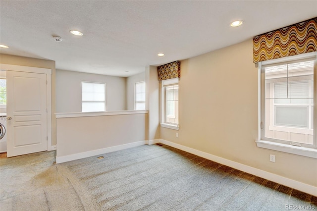 5080 Uinta St, Denver, CO 80238 - spare room featuring carpet, recessed lighting, washer / dryer, and a smoke detector