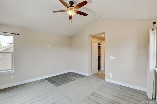 5080 Uinta St, Denver, CO 80238 - carpeted spare room featuring ceiling fan and lofted ceiling