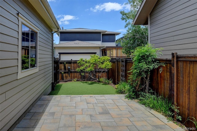 5080 Uinta St, Denver, CO 80238 - fenced backyard featuring a patio area