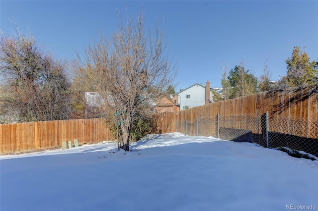 view of snowy yard