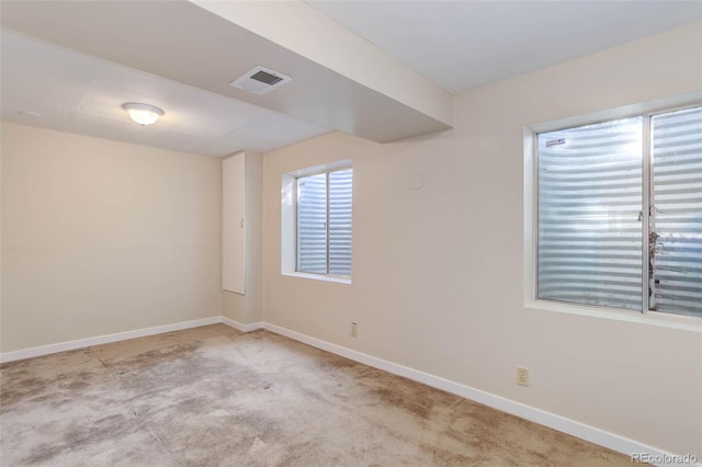 view of carpeted spare room