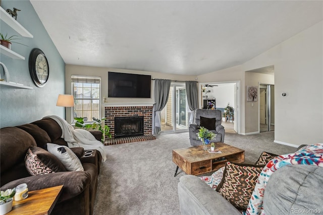 646 S Joplin St, Aurora, CO 80017 - carpeted living room with vaulted ceiling and a fireplace